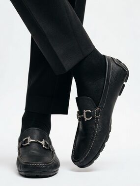 Salvatore Ferragamo men’s black leather loafers with silver buckle